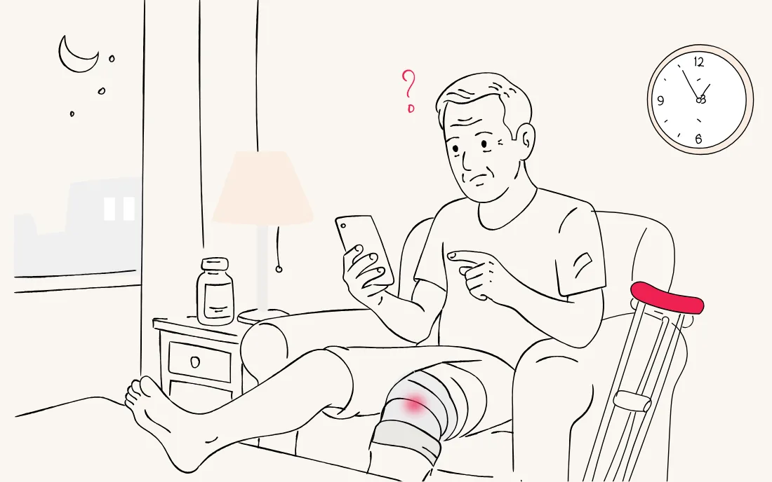 A patient at home late in the evening after knee surgery, looking at his phone with a question and nobody to ask.